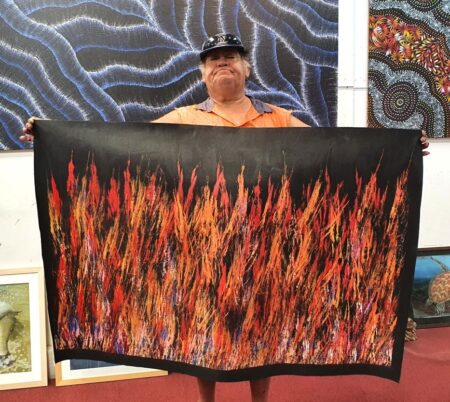 Australian Aboriginal artist Reggie Sultan with artwork No.15855